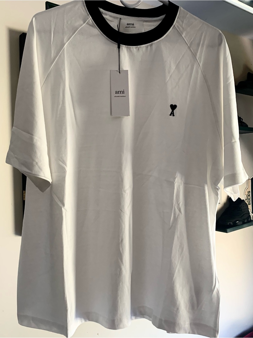 Ami White Short Sleeve Tee with Black Neck Trim and Black Heart Logo